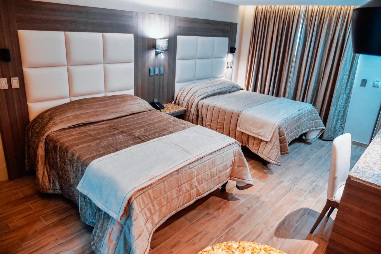 Kavia Meoqui Hotel&Suites Extérieur photo
